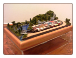 Miniature Train Layout - 4"x7" Oval with Old West Town
